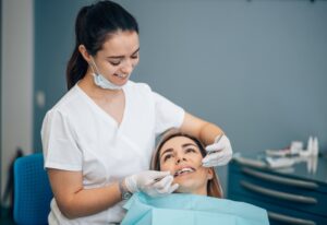 A dentist providing expert care, showcasing the benefits of choosing a Local Dentist in Wheaton, IL